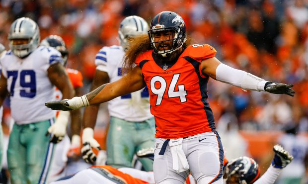 DENVER, CO - SEPTEMBER 17: Nose tackle Domata Peko #94 of the Denver Broncos reacts after making a ...