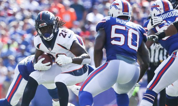 ORCHARD PARK, NY - SEPTEMBER 24:  Jamaal Charles #28 of the Denver Broncos runs the ball as Ramon H...