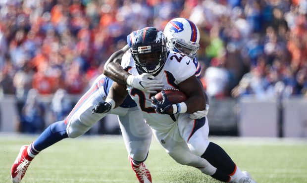 ORCHARD PARK, NY - SEPTEMBER 24:  Ramon Humber #50 of the Buffalo Bills attempts to tackle C.J. And...