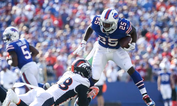 ORCHARD PARK, NY - SEPTEMBER 24: LeSean McCoy #25 of the Buffalo Bills runs the ball as Von Miller ...