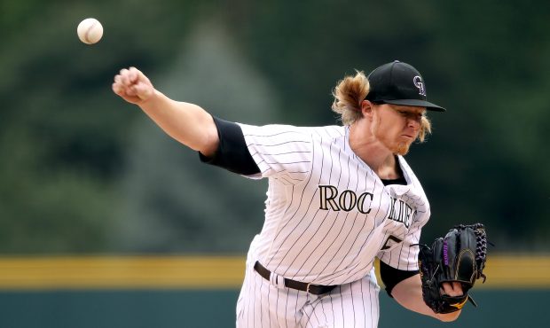 Starting pitcher Jon Gray #55 of the Colorado Rockies throws in the first inning against the Miami ...
