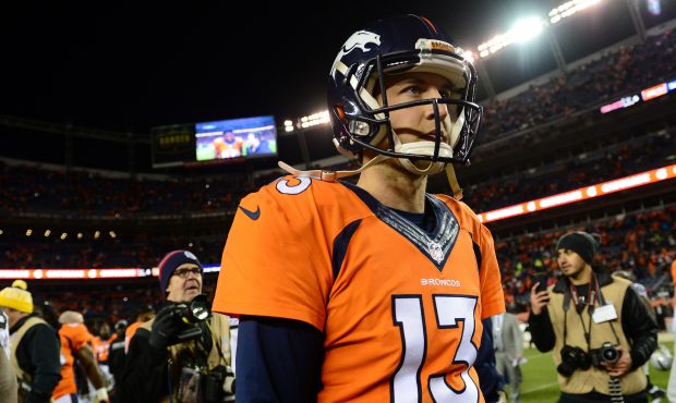 DENVER, CO - JANUARY 1:  Quarterback Trevor Siemian #13 of the Denver Broncos walks off the field a...
