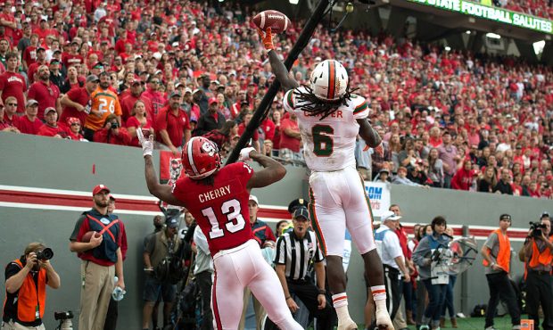 RALEIGH, NC - NOVEMBER 19: Jamal Carter, Sr. #6 of the Miami Hurricanes breaks up a pass intended f...