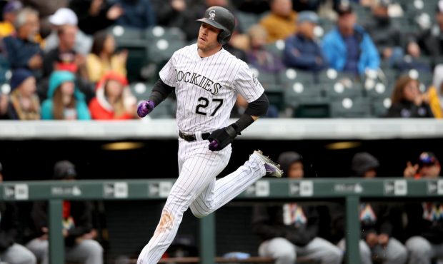 DENVER, CO - SEPTEMBER 27:  Trevor Story #27 of the Colorado Rockies scores on a Ian Desmond  RBI s...
