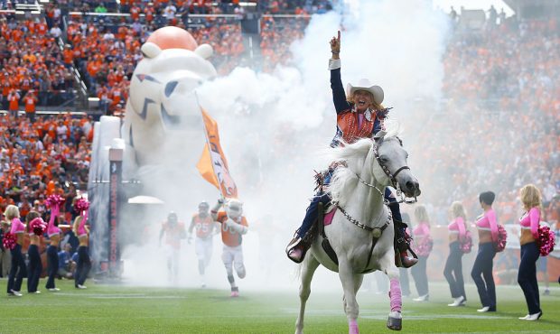 DENVER, CO - OCTOBER 9:  Ann Judge-Wegener rides "Thunder" before the game between the Denver Bronc...