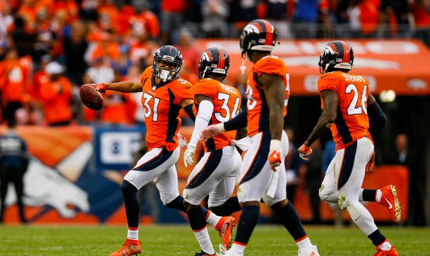 DENVER, CO - OCTOBER 1:  Strong safety Justin Simmons #31 of the Denver Broncos celebrates with tea...