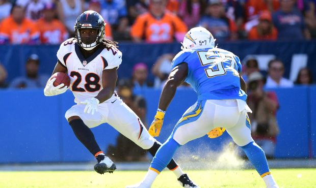 CARSON, CA - OCTOBER 22:  Jamaal Charles #28 of the Denver Broncos cuts back after the catch while ...