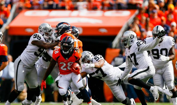 DENVER, CO - OCTOBER 1:  Running back Jamaal Charles #28 of the Denver Broncos rushes against the O...