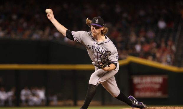 PHOENIX, AZ - SEPTEMBER 12: Starting pitcher Jon Gray #55 of the Colorado Rockies pitches against t...