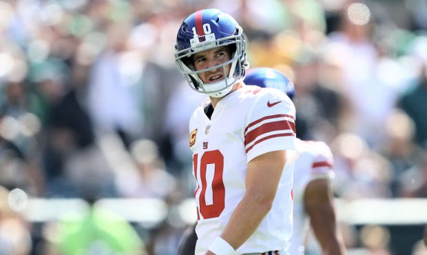 PHILADELPHIA, PA - SEPTEMBER 24:   Eli Manning #10 of the New York Giants walks off the field after...