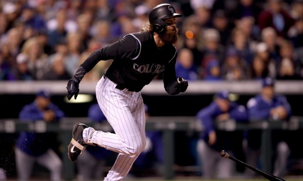 DENVER, CO - SEPTEMBER 29:  Charlie Blackmon #19 of the Colorado Rockies hits a RBI single in the f...