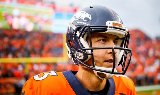 DENVER, CO - OCTOBER 1:  Quarterback Trevor Siemian #13 of the Denver Broncos stands on the field a...