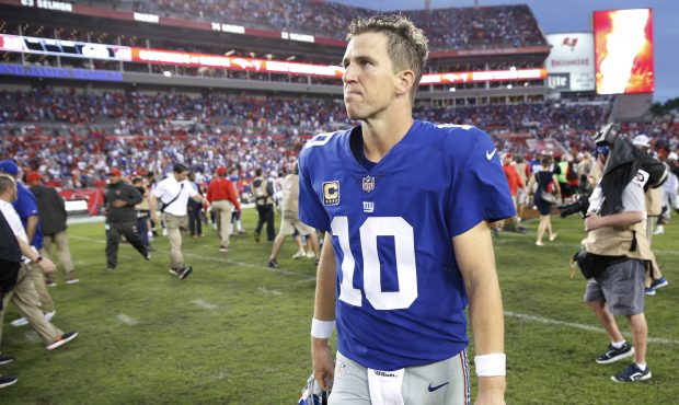 TAMPA, FL - OCTOBER 01: Eli Manning #10 of the New York Giants reacts as he leaves the field after ...