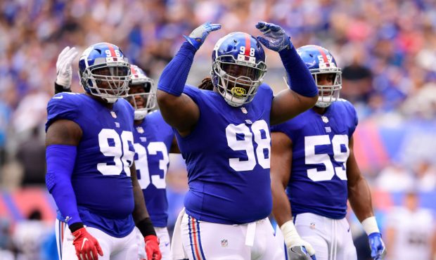 EAST RUTHERFORD, NJ - OCTOBER 08: Damon Harrison #98 of the New York Giants pumps up the crowd duri...
