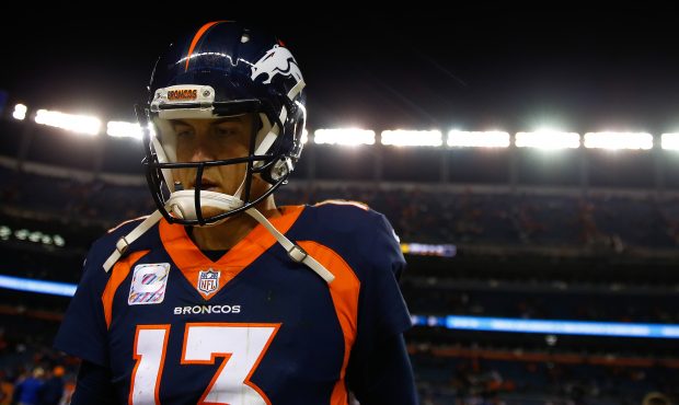 DENVER, CO - OCTOBER 15: Quarterback Trevor Siemian #13 of the Denver Broncos runs off the field af...