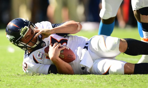 CARSON, CA - OCTOBER 22: Trevor Siemian #13 of the Denver Broncos reacts after getting sacked in th...