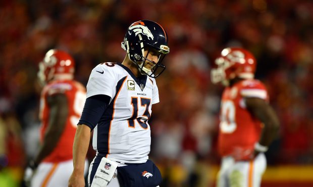 KANSAS CITY, MO - OCTOBER 30: Quarterback Trevor Siemian #13 of the Denver Broncos walks off the fi...