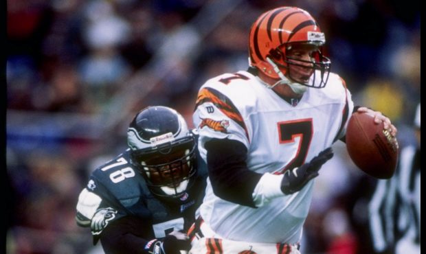 30 Nov 1997:  Quarterback Boomer Esiason of the Cincinnati Bengals tries to get away from defensive...