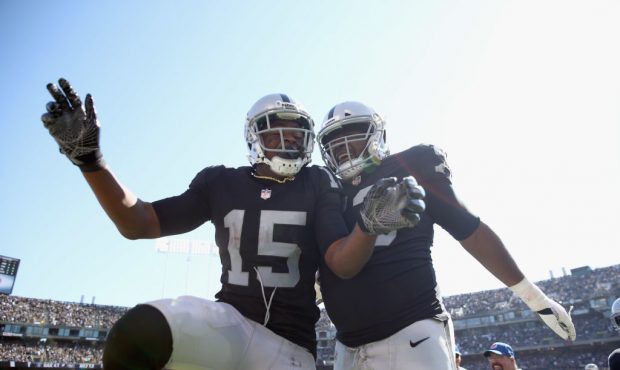 OAKLAND, CA - SEPTEMBER 17:  Michael Crabtree #15 of the Oakland Raiders celebrates with Marshall N...