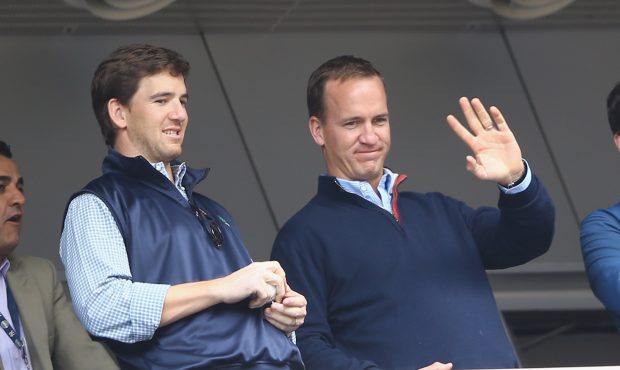 NEW YORK, NY - MAY 04:  Eli Manning of the New York Giants and Peyton Manning of the Denver Broncos...