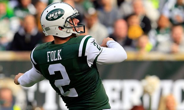 EAST RUTHERFORD, NJ - NOVEMBER 09: Kicker Nick Folk #2 of the New York Jets looks on after kicking ...