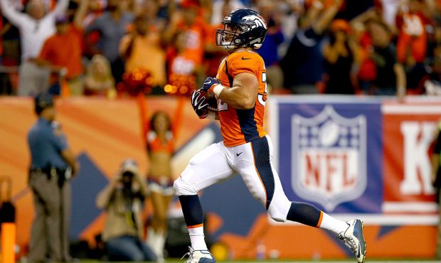 DENVER, CO - SEPTEMBER 08:  Fullback Andy Janovich #32 of the Denver Broncos scores on a 28-yard to...