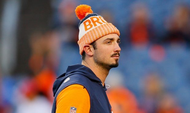 DENVER, CO - OCTOBER 15:  Quarterback Paxton Lynch #12 of the Denver Broncos looks on from the fiel...