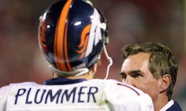 KANSAS CITY, MO - NOVEMBER 23:  Quarterback Jake Plummer #16 talks with head coach Mike Shanahan of...