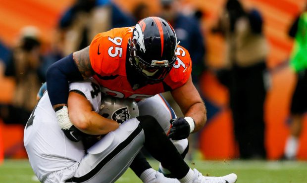 DENVER, CO - OCTOBER 1:  Defensive end Derek Wolfe #95 of the Denver Broncos sacks quarterback Dere...