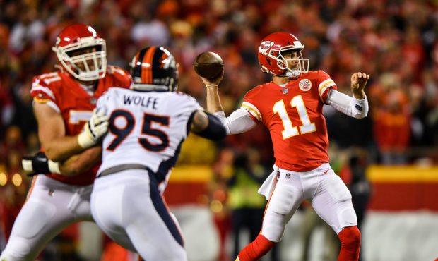KANSAS CITY, MO - OCTOBER 30: Quarterback Alex Smith #11 of the Kansas City Chiefs throws a pass th...