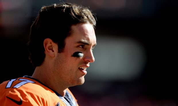 Brock Osweiler #17 of the Denver Broncos looks on before the AFC Championship game against the New ...