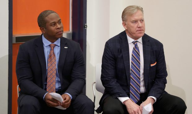 Vance Josepf waits with Denver Broncos General Manager John Elway to be introduced as the new head ...