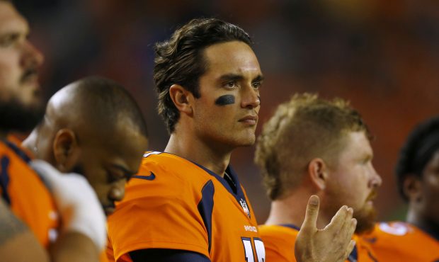 Quarterback Brock Osweiler #17 of the Denver Broncos watches opening ceremonies against the Los Ang...