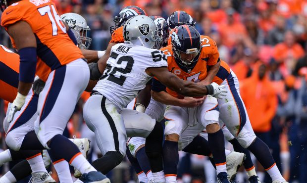 DENVER, CO - OCTOBER 1:  Quarterback Trevor Siemian #13 of the Denver Broncos is sacked by defensiv...