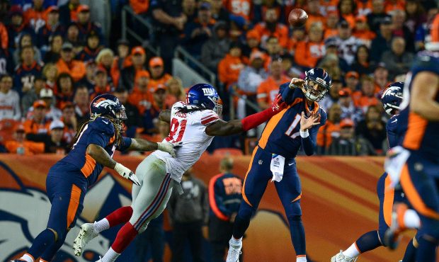 DENVER, CO - OCTOBER 15:  Quarterback Brock Osweiler #17 of the Denver Broncos passes against the N...