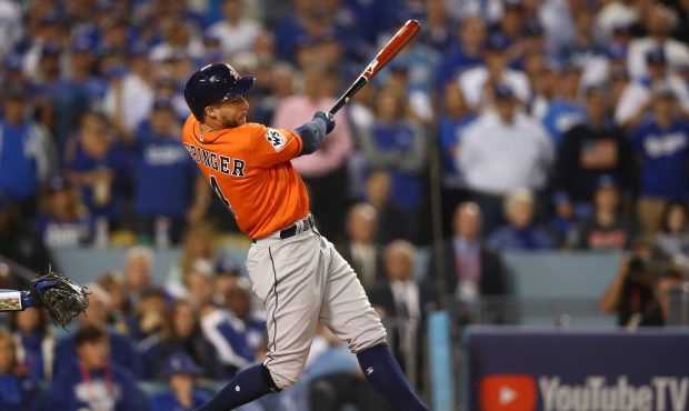 LOS ANGELES, CA - NOVEMBER 01:  George Springer #4 of the Houston Astros hits a two-run home run du...