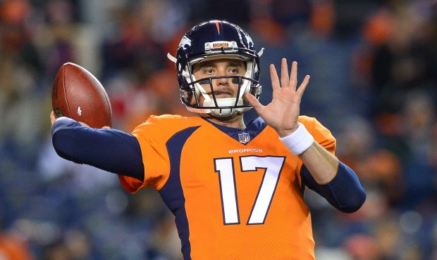 DENVER, CO - NOVEMBER 12: Quarterback Brock Osweiler #17 of the Denver Broncos warms up before a ga...