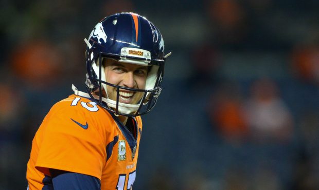 DENVER, CO - NOVEMBER 12:  Quarterback Trevor Siemian #13 of the Denver Broncos smiles as he warms ...
