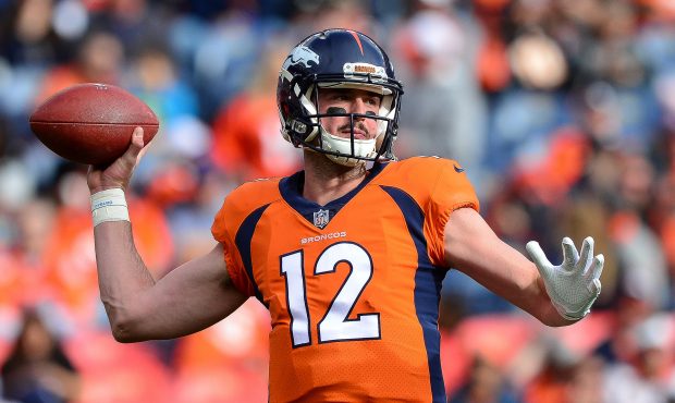 DENVER, CO - NOVEMBER 19: Quarterback Paxton Lynch #12 of the Denver Broncos throws as he warms up ...