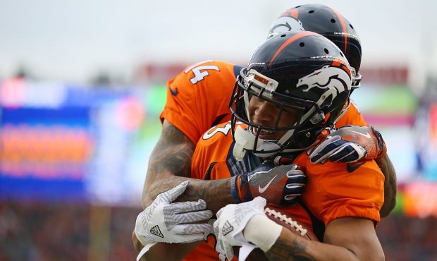 DENVER, CO - JANUARY 1:  Running back Devontae Booker #23 of the Denver Broncos celebrates with wid...