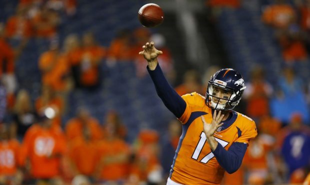 DENVER, CO - SEPTEMBER 11:  Quarterback Brock Osweiler #17 of the Denver Broncos warms up before th...