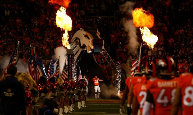 DENVER, CO - NOVEMBER 12:  Cornerback Chris Harris #25 of the Denver Broncos walks onto the field d...