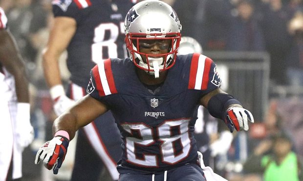 FOXBORO, MA - OCTOBER 22:  James White #28 of the New England Patriots reacts after catching a touc...