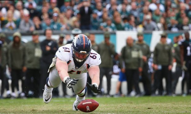 PHILADELPHIA, PA - NOVEMBER 05: Center Matt Paradis #61 of the Denver Broncos dives on a fumble aga...