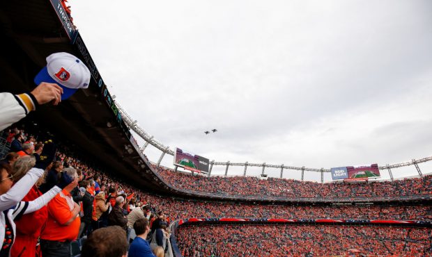 DENVER, CO - NOVEMBER 19:  A pair of F-16 fighter jets perform a flyover in a general view before a...