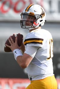 Quarterback Josh Allen #17 of the Wyoming Cowboys warms up on the field before the team's game against the UNLV Rebels at Sam Boyd Stadium on November 12, 2016 in Las Vegas, Nevada. UNLV won 69-66 in triple overtime. (Photo by Ethan Miller/Getty Images)