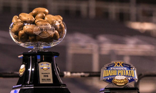 Famous Idaho Potato Bowl team championship and MVP trophies on display at the Famous Idaho Potato B...