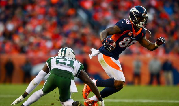 Wide receiver Demaryius Thomas #88 of the Denver Broncos makes a catch under coverage by cornerback...