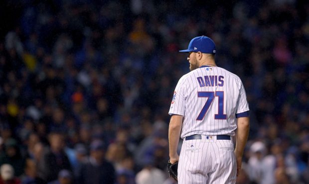Wade Davis #71 of the Chicago Cubs pitches in the eighth inning during game four of the National Le...