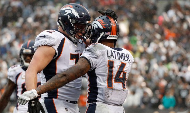 OAKLAND, CA - NOVEMBER 26: Cody Latimer #14 of the Denver Broncos is being congratulated by teammat...
